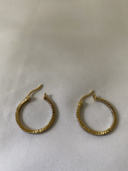 Pair Of Gold Over Sterling Silver Hoop Earrings For Pierced Ears. 1” from an estate, in “as found” condition. We have not cleaned or polished this item. They are marked 925 China. They have a rough finish with clear stones.