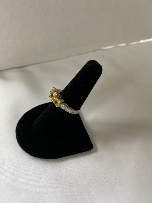 Gorgeous Sterling Silver Ring With Triple Yellow Stone Setting, Size 8 from an estate, in “as found” condition. We have not cleaned or polished this item. Marked 925. This ring & setting is stunning. 