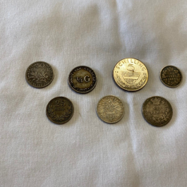 Group Of 7 Old Foreign Silver Coins – 1884, 1885, 1910, 1914, And More