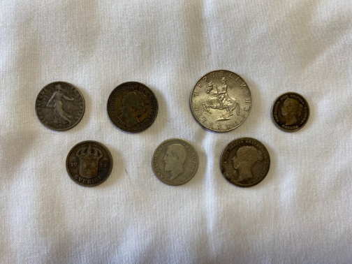 Group Of 7 Old Foreign Silver Coins – 1884, 1885, 1910, 1914, And More