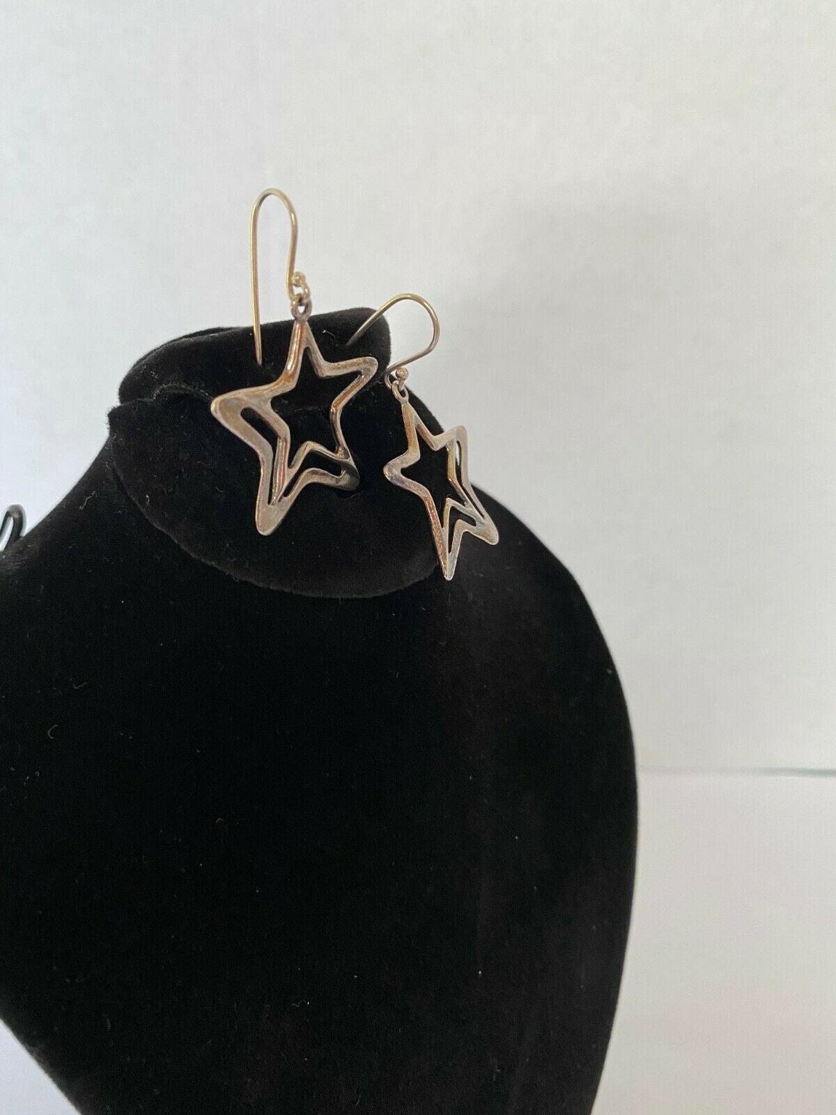 Sterling SilSterling Silver Dangling Star Earringsver Dangling Star Earrings in “as found” condition. We have not cleaned or polished this item. Marked Israel 925 and measure approximately 1½” in length and shaped like a star. Please view the images for condition and details and grade by your own grading standards. No returns.