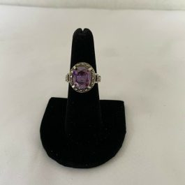 Sterling Silver Marcasite Ring Accented With Amethyst Colored Center Stone