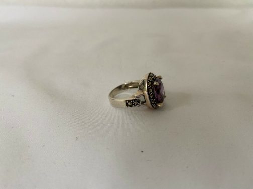 Sterling Silver Marcasite Ring Accented With Amethyst Colored Center Stone