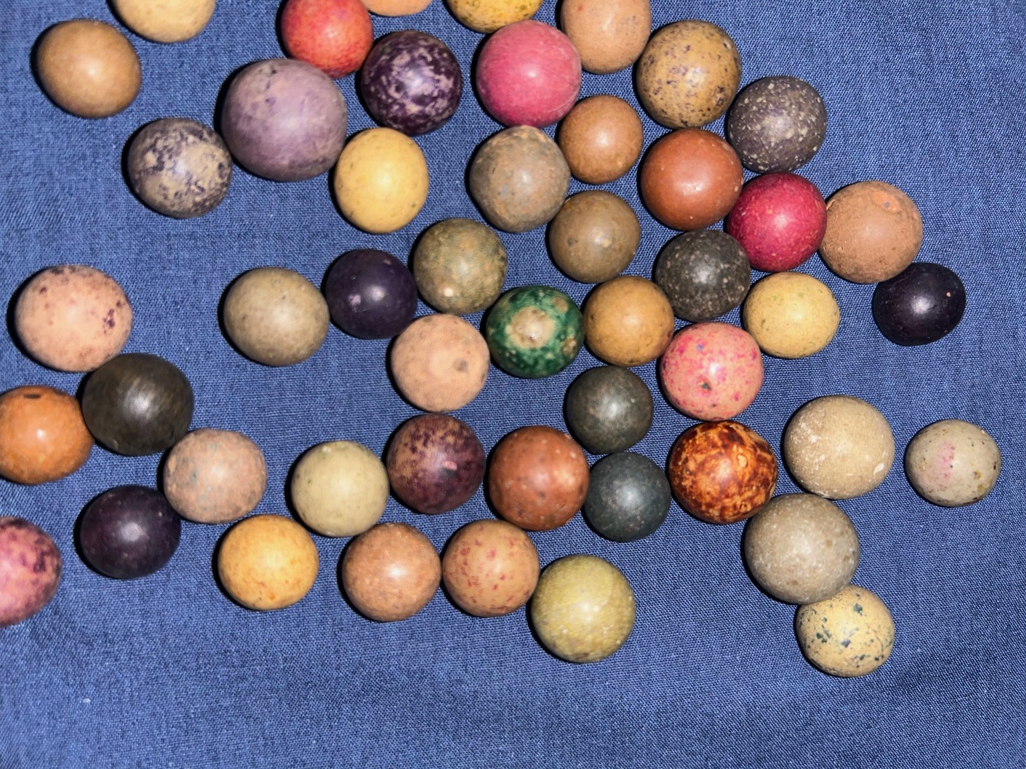 54 Antique Clay Marbles